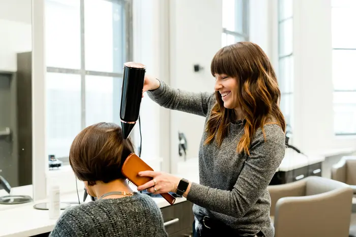Hairdresser working in a salon